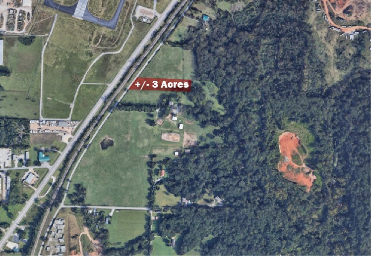 Great level and open +/- 3 Acre tract of land in Rogers across from Rogers Airport and close to TRG Recycling. This land, currently zoned A-1 Agriculture, offers convenient railroad access, making it an excellent location for establishing and operating your business!