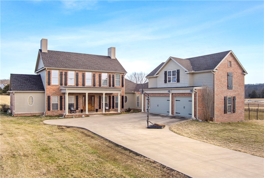 This is it!!! Your perfect home on a 4 acre lot in Elkins! Come check out this secluded neighborhood thatās just minutes from shopping, schools, beautiful rivers, and just outside of the bustling Fayetteville, AR. This home has it all with 4,589 heated sqft and a 3 car garage. Upon entering the home, youāll find the parlor room/family room with a cozy wood burning fireplace and an office just off the entrance. Downstairs youāll find the master suite with a private patio entrance, a massive master bath with his/her walk-in closets, a gourmet eat in kitchen with wet bar, a beverage cooler, a butlers pantry, and double ovens. Also downstairs is the formal dining and large living room with beautiful vaulted ceilings, crown molding, and a 2nd wood burning fireplace.
Upstairs youāll find three large bedrooms and 2 full baths as well as a separate built in office space.
The recreation room/mother in law suite is equipped with a full bath and plumbed for a full kitchen.
Come visit this one asap!