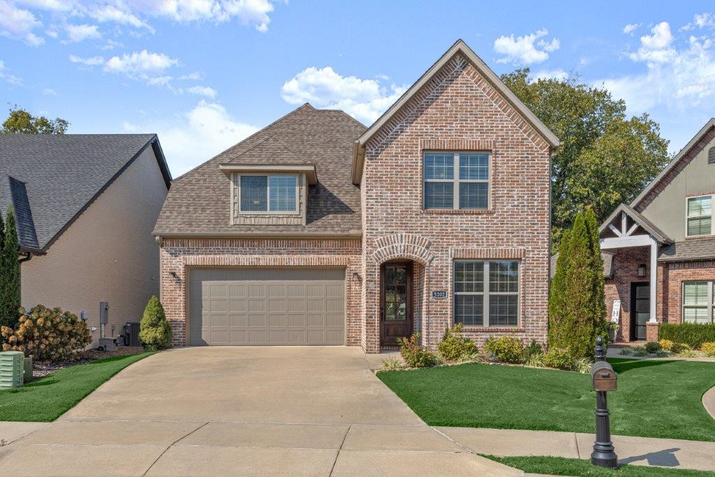 Fantastic opportunity to own a Beautiful Garden Home located in the prestigious gated community of Shadow Valley. Located near everything NWA this home backs up to the Short Game practice area with beautiful views and offers a Golf Membership. This inviting open split floor plan features beautiful interior finishes of designer lighting, spacious living room, eat-in kitchen, oversized master bedroom, 1 additional bedroom that could be used as an office all on the main level. On the second level the home features 2 large bedrooms and 1 full bath with 1 potentially used as a Bonus Room. This golf front property also features central VAC, sprinkler system, granite counters, gas cooktop, covered back patio, versatile floor plan, and so much more.