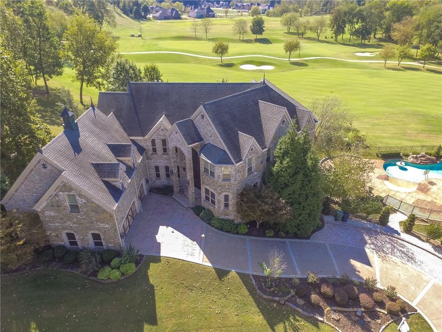 High end living at its finest at this stunning Shadow Valley estate.Golf front location sitting on two lots, this home has gorgeous views & privacy. Multiple outdoor living areas, private pool & pool house. Grand entrance.Brand new paint & painted cabinets,vaulted ceilings & wood floors throughout.Formal Dining room.Office has built-ins & beautiful wood trim detail.Living room is open to kitchen,boasts large windows providing great views.Gourmet kitchen has granite tops, gas range, & built-ins. Master suite has fireplace & patio access. Master bath is spacious with walk-in shower, double vanity & jacuzzi tub. His & her walk-in closets have custom shelves & cabinets. Home Theatre w/wet bar. Game room. 3 large additional bedrooms. Manicured grounds W/mature trees & iron fencing.Large covered deck, gazebo & patio provide ample space for outdoor entertaining.Pool house has large living space, kitchen, bedroom & bathroom as well as a bonus room. This stunning home is an absolute must see!