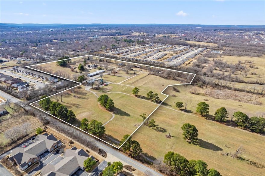 This 28.03 acre site, conveniently placed between I-49 and Hwy 112, is a premier investment opportunity for multi-family development.  Approved for 602 residential units, this site is ideal for investors and developers looking to capitalize on Fayetteville’s expanding housing market. With high-density zoning already in place, the property is well-positioned for a large-scale apartment community, build-to-rent project, or mixed-use development. Highlights include: Raw land with access to city water, sewer, and electric. High-Density Zoning maximizing development potential. Strategic Location  Near I-49 and Hwy 112, providing easy connectivity to key employment and retail centers. Rapid Growth Area, West Fayetteville is experiencing strong residential and commercial expansion infrastructure access simplifies the development process. Increasing rental demand driven by population and job growth.