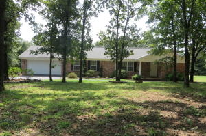 Centered in Privacy..... From the center of privacy, many people pass by this property and never know its even there. Quietly nestled into the corner of one of West Crow Mtn finest neighborhoods is this unique property only 12 minutes to Russellville for the Seller yet so quite that you feel like you have been magically transported to the middle of the Ozark Mountains.