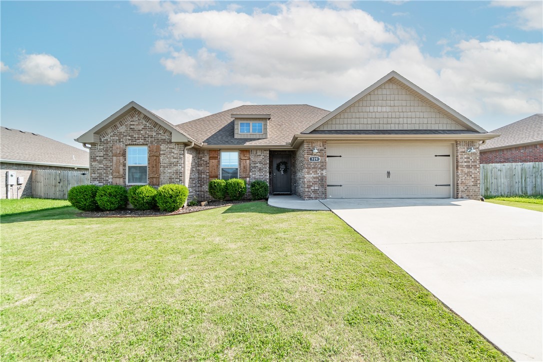 Welcome to this all brick Bentonville home! This 3 bed, 2 bath home features a split floor plan and open concept living area with cathedral ceilings. The spacious living room opens to the bright and airy eat-in kitchen that features ample storage space, granite countertops and a walk-in pantry. Unwind in the master suite offering tray ceilings and an ensuite bathroom with a double vanity, soaking tub, and oversized walk in closet. The modern touches and neutral color scheme throughout the home offers the perfect canvas to make the space your own. Enjoy evenings in your large, fully fenced backyard complete with an oversized deck ideal for hosting. Don't miss this opportunity to make this home yours today!
