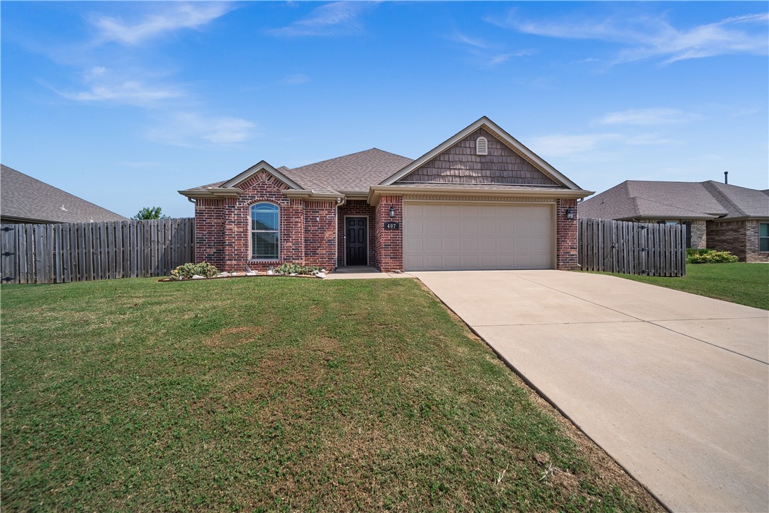 Welcome to this comfortable yet elegant home situated in a lovely south Rogers subdivision. Step inside, you’ll be greeted by crown molding and tray ceiling in the master suite. The kitchen offers both functionality and style along with an eat-in kitchen. For cozy evenings, gather around the fireplace in the living room or the firepit in the backyard. Having all the appliances provided in the house eliminates the need for additional expenses associated with purchasing and installing yourself.