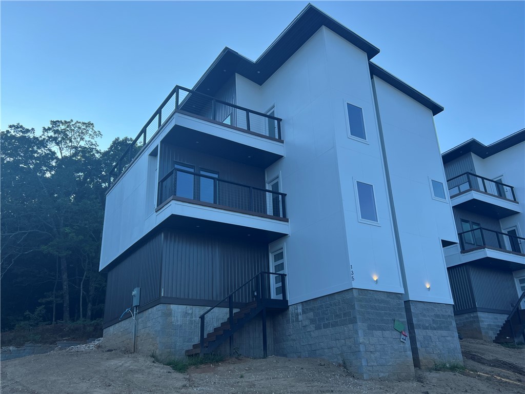 This stunning new construction in South Fayetteville combines modern
design with an unbeatable location near trails, schools, and more. Enjoy
breathtaking rooftop views from the terraces, a two-car garage with
frosted glass doors, and a custom landscaped front yard. The open floor
plan features hand-scraped hardwood floors, a gas fireplace, and a
beautifully designed kitchen with granite countertops, stainless steel
appliances, and a built-in pantry. The master suite offers built-in
cabinets, a serene bathroom with a walk-in shower and double vanity,
and a spacious walk-in closet. Guest bedrooms feature cozy carpet, and
the home is complete with laundry hookups and thoughtful finishes
throughout. Donāt miss out on this one-of-a-kind home! Approved borrowers will receive a closing cost credit of 1% of the loan amount up to $5,000 on their Closing Disclosure on their loan closing with Envoy Mortgage Branch NMLS #2659248 and Branch NMLS #2579798