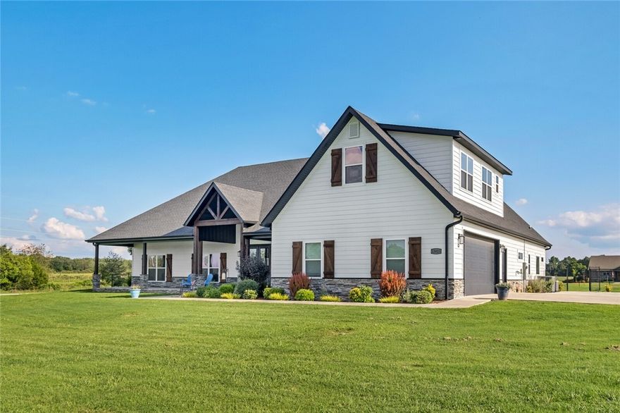 Stunning estate home in the country on 4.46 acres with a custom pool, all within a couple miles of town. As you walk into this custom built home you are greeted by a beautiful open concept living area, cedar wood beams and a rock fireplace that spans all the way to the vaulted ceiling. Large windows throughout the home allow the outdoor living spaces to be enjoyed while inside the home. Luxurious quartz counters, wood look tile and upgrades throughout the home give it a feel of a country estate. The master suite is everything you would imagine in a home of this caliber. It boasts an extensive walk in closet, double vanities, soaking tub with chandelier above and a door to access the outdoor entertainment area. A great bonus room upstairs with a full bathroom can double as a 5th bedroom or game room. 
The backyard is an entertainment oasis where you can watch the sun set over your incredible estate. Check out a Virtual Tour here: https://youtu.be/a7m2DTF8sT8