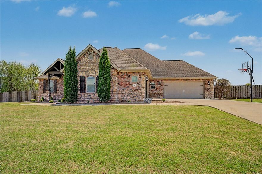 Situated at 401 Eagle Ridge DR in Farmington, Arkansas, USA, this single family residence, built in 2016, offers a truly luxurious environment within a desirable residential area. It showcases an amazing design with top tier materials throughout, maintained in great condition to provide an exceptional living experience. The culinary heart of this residence features elegant stone countertops and classic shaker cabinets, offering a refined aesthetic. A thoughtfully designed backsplash enhances the space, while a large kitchen island and a convenient kitchen peninsula provide generous surfaces for preparation and gathering. Crown molding adds an elegant finish, complemented by a custom range hood positioned above the stovetop and double oven, creating an inviting atmosphere for culinary pursuits. The living room offers an expansive atmosphere with its high ceiling and vaulted ceiling, creating an airy feel. Pool has a newer liner and outdoor bathroom.  Home has instant hot water heater.