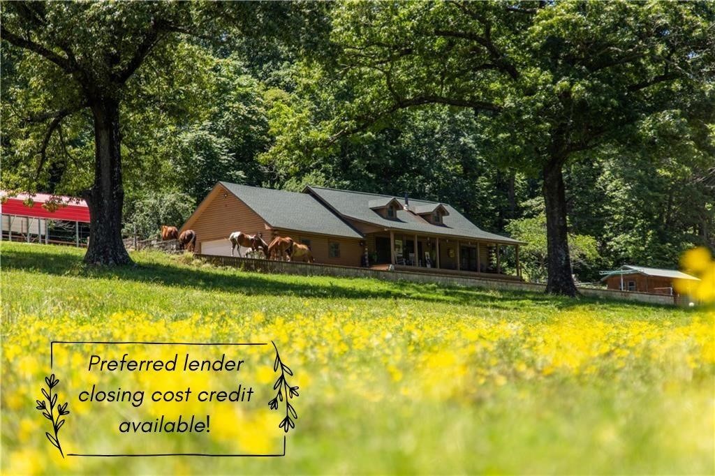 Charming Log Home Retreat on 88.35 Acres Discover the serenity of this well maintained log home nestled on 88.35 acres of breathtaking landscape. With stunning views and abundant natural beauty, this property is a true haven for nature lovers, farmers, and hunters alike.The land features approximately 46 acres of woods and 42 acres of lush pasture, ideal for cattle, horses, and goats, complemented by cross fencing for optimal management. The well-maintained property boasts three barns, providing ample space for storage and equipment. Enjoy the outdoors with three stocked ponds and a year-round spring creek.The log home itself has been beautifully renovated, offering modern comforts while retaining its rustic charm. The main floor hosts spacious bedrooms. A walk-up loft, currently utilized as a bedroom and office, offers additional living space and stunning views. ASK about the perfered lender credit for closing cost or prepaids. MLS attachments highligt all of the features. Also listed as Residential MLS 1312244