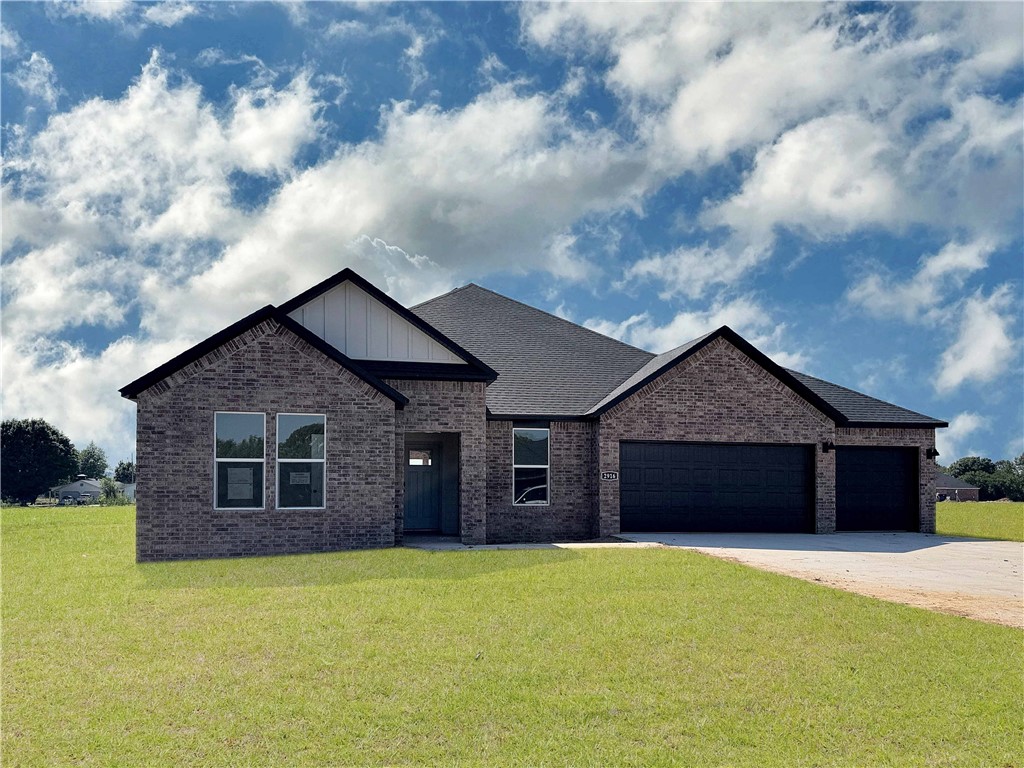 Sold before print! Fabulous Frisco plan with a 3-car garage in Monitor Meadows, where you'll experience modern luxury in Springdale, Arkansas. Our meticulously crafted floor plans provide ample space for you to grow and thrive. Bedroom 1 will have a fan, and your fabulous ensuite will have an oversized walk-in shower, elongated commode and quartz counters. You'll find fantastic quartz counter tops also in the kitchen with tile backsplash and 42-inch upper cabinets. Black plumbing fixtures throughout! LED lighting throughout! Living room will have a fan and a modern electric fireplace with a poplar mantle.