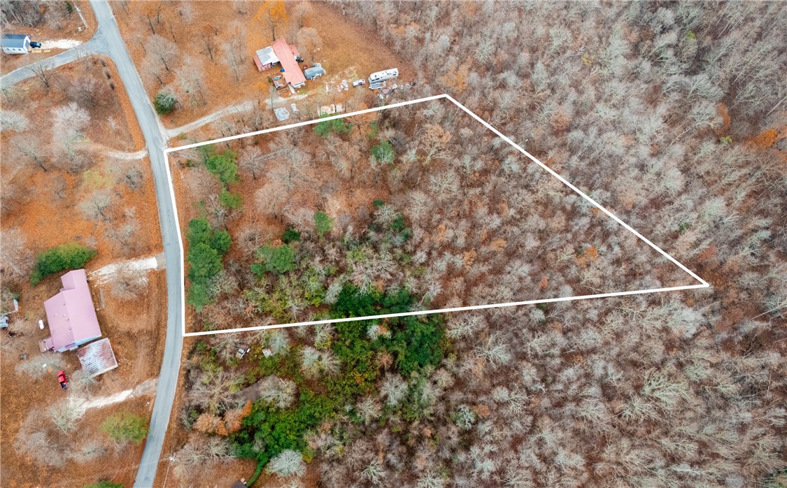 This 2.25-acre mostly cleared, wooded lot in the desirable Wedington Woods IV Subdivision offers a prime opportunity to build your dream home in Fayetteville. With water, electric, cable, and septic already in place, itās ready for development. Enjoy the space and privacy this lot provides while still being conveniently located to all the amenities Fayetteville has to offer. Mobile homes are allowed on property.