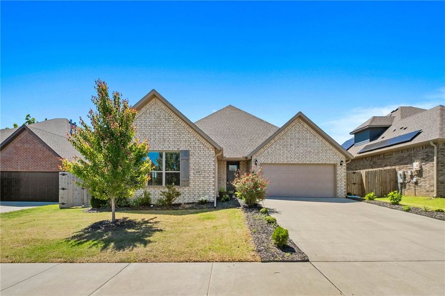 Welcome to this beautiful, east-facing 3Br, 2.5Ba home offering the perfect blend of modern luxury and comfort. Built in 2022, the home features a bright, open-concept floor plan designed for joyous daily living and entertaining. The spacious great room impresses with vaulted ceilings, exposed wooden beam, & a cozy gas-log fireplace, all flooded with natural light. At the heart of the home is a cordial kitchen complete with a large island, granite countertops, and stainless steel appliances. The main-floor primary suite serves as a private retreat, featuring a generous walk-in closet and an upscale ensuite bath with a large walk-in shower. A convenient powder room is also located on the main level for guests. Upstairs, you will find two spacious bedrooms connected by a functional Jack & Jill bathroom. Step outside to a large covered back patio and a fully privacy-fenced backyard, ideal for outdoor living. With standout curb appeal and splendid finishes throughout, this property is truly a great place to call home.