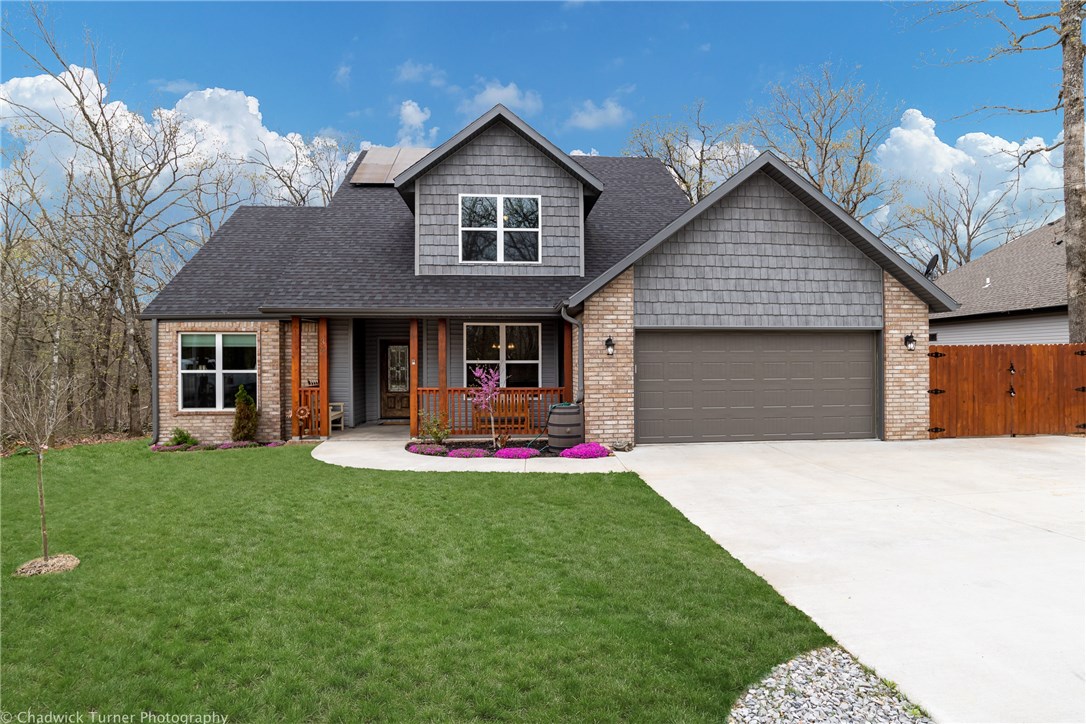 Better than new! Enjoy drinking coffee on your covered back porch and watching the wildlife in your own backyard! Upgrades include real wood blinds throughout, extra paved parking slab for a car, boat or RV, solar panels, dog run, and retractable sun shade on the back porch. House boasts 3 beds/2.5 baths, dining room, and bonus room. Don't miss out on this immaculately kept home that's sure to impress!