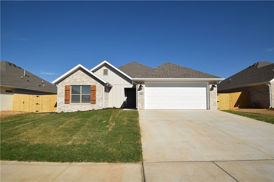 Newer home for Rent in Great Location! This home offers an open floor plan with Three Bedrooms, 2baths, and 2 car garage. Kitchen has granite countertops & stainless appliances and pantry. Home comes with refrigerator, washer & dryer included as well as blinds. This is a split bedroom plan and home has large back yard with 6' wood privacy fence and covered patio. No Smoking, Pets negotiable with additional deposit and owner approval. This has a Bentonville mailing address.