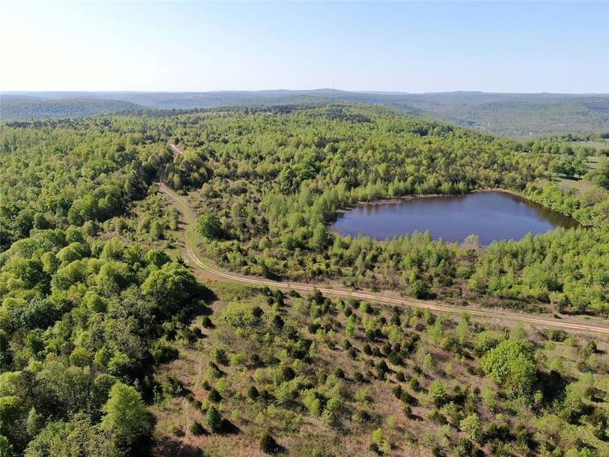 Beautiful mostly wooded 2241 acre tract. 5 acre lake, Highway 66 frontage, quality interior road, lots of mature hardwoods and some pine. Properties of this size are hard to find.