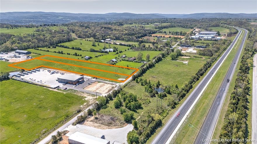 PRIME 5.62-ACRE INDUSTRIAL SITE WITH ROAD FRONTAGE AND I-49 ACCESS IN NWA. This combined 5.62-acre offering (2.85 acres + 2.77 acres) features flat, usable land in a desirable industrial park in one of Northwest Arkansas’s fastest-growing corridors. Electric is on-site, with public water at the street, making the property ideal for industrial or commercial development. The site offers excellent road frontage, strong visibility, and efficient access for transportation & logistics, with quick connectivity to I-49 and regional markets. The combined acreage allows flexibility for larger-scale development or future expansion, appealing to owner-users, developers & long-term investors. With utilities in place & a build-ready landscape, this property minimizes upfront development costs while maximizing future growth potential. Opportunities of this size and quality in such a strategic location are increasingly rare. Schedule your showing today & secure a prime foothold in Northwest Arkansas’s expanding industrial market.