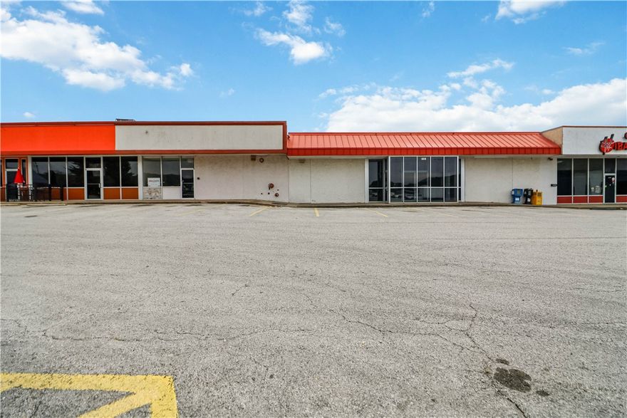 Prime Commercial Space Near the University of Arkansas!
Fantastic location within walking distance to the University of Arkansas and close to major road frontage, restaurants, the business district, and scenic walking trails. This 1,493 SF office space—formerly occupied by the Internal Revenue Service—comes equipped with an efficient cubicle layout, ideal for office or professional use. (Note: rear storage/warehouse area not included in lease.)

Situated between two popular restaurants, this property offers excellent visibility, ample shared parking, and strong traffic counts just off Interstate 49. Modified Triple Net lease at $1.80/SF, for taxes &  insurance, and common area maintenance is billed as needed. Perfect for businesses seeking convenience, accessibility, and a high-traffic location in Fayetteville’s thriving commercial corridor!