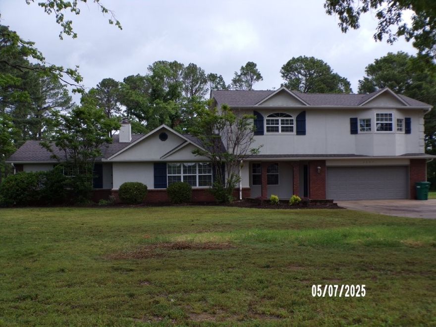 Estate size lot right in the middle of town, Prime location near major retail and entertainment centers. Main level has large living room with fireplace, eat in kitchen area, primary suite with dual walk-in closets, office. Upper level has 3 guest bedrooms, jack and jill bath and flex space area. New carpet and interior paint throughout. Large attached 2 car garage and detached shop/garage.
