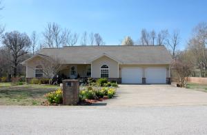 FANTASTIC HOME IN GREAT NEIGHBORHOOD! This 4BR/3BA home w/ finished walk-out basement is located just outside the city limits in a highly sought after location! Home has over 3,000 sq. ft. w/ new paint throughout, ceramic tile & granite counter-tops in the kitchen, a breakfast nook & formal dining room! There's also a covered back deck to take in the AMAZING backyard that is almost a full acre!