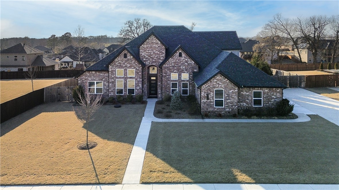This 2020 built Home is Where You Belong! Featuring 5 bedroom 3.5 bath, dedicated office, walk-in pantry, laundry room with sink and mud room storage. This kitchen is where you want to be featuring a double oven, 5 burner gas range with pot filler, stainless steel appliances and an oversized island. Walk from your kitchen to your formal dining room through the arched ceiling of the coffee bar/ bar area. 4 bedroom 3 full baths on the main level, second level features 16x16 bedroom with half bath or bonus room. Attic storage with easy access from the second level. Low maintenance landscaping features with irrigation system.