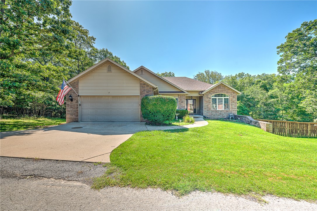 This 4 bedroom / 3 full bath house is situated on a generous .61 acre lot in Bella Vista. The thoughtfully designed layout includes a finished basement, providing flexible space for a home office, entertainment room, or recreation area. This property is just steps away from the Back 40 Trail, Blowing Springs, and the lake, offering direct access to some of Northwest Arkansas's most scenic outdoor adventures. Enjoy the peaceful surroundings, spacious interior, and beautiful location.