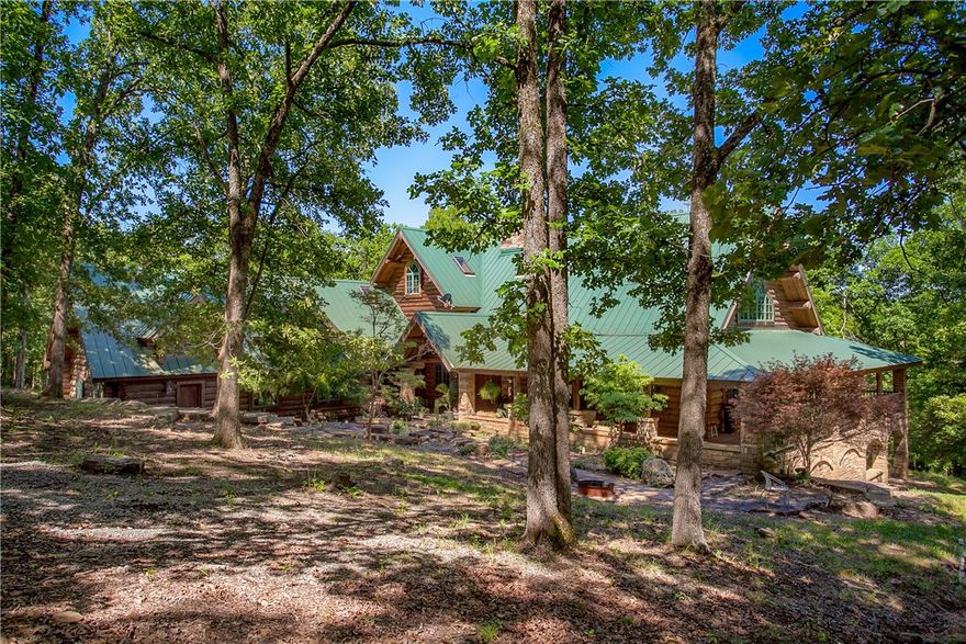Hunting Lodge or Horse/Cattle Ranch! Spectacular 200+ AC with over 1/2 mile of White River frontage, 2 guest houses, horse barn, stocked pond plus lots of wildlife (deer galore)! Gorgeous main house is 9,550 SF, log/stone, 3 levels, smart wired, elevator, 5 FPs. The 44x36 great room would make the perfect meeting place for a lodge, as well as the 3800 SF of outdoor living areas. Your own private oasis! Fenced & cross fenced. Trades Possible. Agent owned.