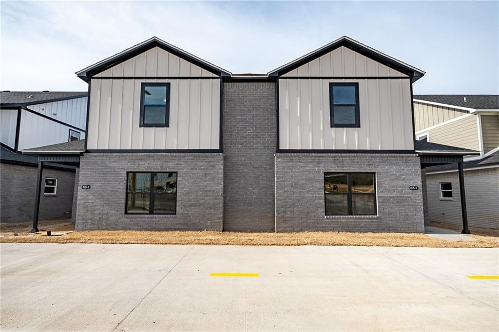 Modern newly built 4 bed 4.5 bath duplex located in a fast growing area of Fayetteville, with a bike trail at your front door. Large open living room and kitchen with 1/2 bath complete the first floor. Kitchen has granite countertops, SS appliances. Refrigerator, washer/dryer included. Four bedrooms upstairs. All bedrooms have a full bath and walk-in closet. 2 car garage and upstairs balcony. This property is already preleased for the 2024 school year. Apply at PrimeNWA.com