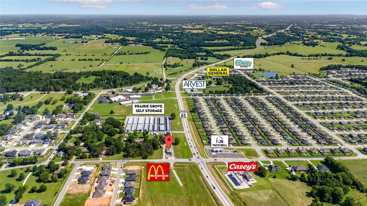 Corner lot for sale or ground lease in a rapidly developing Prairie Grove commercial corridor. This property is perfect for any business requiring high visibility along Hwy 62. Surrounded by new subdivisions, and within 15 minutes of I-49.
Property located at 4-way lighted corner.
Near recently constructed Casey's General Store & Taco Bell. McDonald's & Domino's coming soon.
Commercial zoning with all utilities on site.
Approx. 333' of frontage on Hwy 62.
Owner will ground lease.