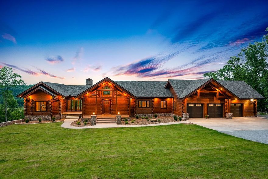 Truly one of a kind Western Red Cedar log home with breathtaking views of the White River.  Over 24 acres of natural beauty.