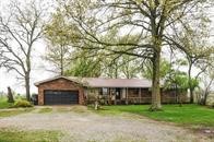 Nestled on a sprawling 5-acre lot, this 4-bedroom, 2-bathroom home offers the perfect blend of comfort and functionality. Ideal for those seeking a serene lifestyle, this property is a fully operational hobby farm, complete with a tack room, a horse barn featuring two stalls and a spacious 1,200 sq. ft. shop. The home itself boasts a warm and inviting atmosphere, with distinct living spaces that provide both privacy and comfort. The kitchen is perfect for culinary adventures, while each bedroom is generously sized, providing a peaceful sanctuary for rest and relaxation. The property includes a safe room/storm shelter, offering peace of mind during inclement weather. Outside, you'll find meticulously maintained metal fences that enhance the property's charm and security. Whether you're an equestrian enthusiast or simply looking for a tranquil escape, this property offers endless possibilities. Don't miss the opportunity to own this unique slice of paradise.