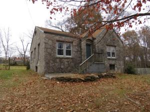 Stone exterior home, on a spacious lot with large trees. 3 Bedroom, 1 bath home, with hardwood floors, gas log fireplace and a partial, unfinished basement. Property is lender owned, is being sold "as-is" and U. S. Bank is making no representation or warranties. Property will be conveyed by a Special Warranty Deed. A min. of $500 earnest money is required with all offers or 2% if cash offer.