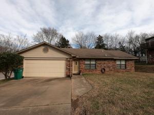 You'll love this low maintenance brick 3 bedroom, 2 bath home. Exposed beams accentuate the cathedral ceiling for a spacious feel. The kitchen has plenty of counter space and bar for extra seating and features an eat-in-kitchen. Fenced in backyard and perfectly Located near Sequoyah elementary school and many other amenities including grocery store, hospital, retail and more. Not many homes for $119,900 in Russellville, don't wait long or this one will be gone!