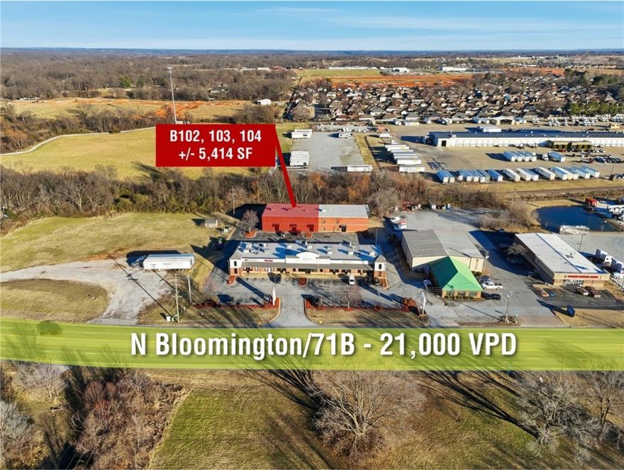 +/- 5,400 SF of versatile flex/warehouse space available in Lowell, ideal for warehouse, distribution, light manufacturing, or flex use. Situated off N Bloomington/71B, which sees approx. 21,000 VPD, this space features two overhead doors (approx. 10' W x 12' H), three storefront style entry doors, and impressive clear heights with 21' ceilings in the rear and 23' ceilings in the front. The first floor offers an open shop/warehouse area, private office, and restroom. The second floor loft includes a kitchenette and additional restroom, providing functional space for staff or administrative use. 2 year minimum term. Tenant is responsible for electric, gas, and water in their own name. Excellent location, approx. 1 mile from W Pleasant Grove Rd and under 2 miles from I-49, offering quick access to anywhere in NWA!