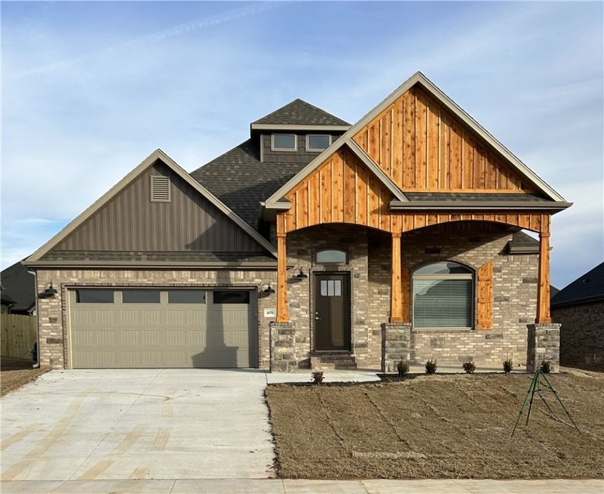 Remarkable new construction 3 bed 2.5 bath single story home is now available. Complete with SS built-in appliances including gas cooktop and granite countertops. Built-in bookcases flank the living room fireplace for the perfect architectural focal point. Windows are wood cased and have 2 1/2 in blinds installed. Large front porch, fully sodded yard, landscaping and privacy fence give the home tremendous curb appeal. The back porch is covered and home has fully installed gutters. Keyless pad on garage door for ease of access opens the garage door to a full size garage space. Primary bathroom has an oversized 5 x 5 tile shower and the closet conveniently wraps around into the laundry room located close to the garage for ease of access. The second and third bedrooms share a Jack & Jill bathroom, and there is a convenient half bath for guests. Exterior brick and cedar construction for long life ease of maintenance. Make this your next home.  Mailing address is Bentonville, home located inside Centerton city limits.