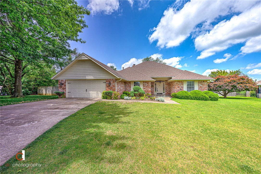 Baby itās hot outside, but this house is the perfect way to entertain & cool off at the same time. The in-ground pool & covered patio/deck area are perfect for hot summer days & nights. Walk into a large open living space, featuring a double āsided fireplace shared by the living room & kitchen areas. This home features 3 bedrooms, 2 baths, with each bedroom having bathroom access. The master bedroom features a 10x10 sitting area, with a view, that would make a fantastic home office space. Beautiful mature trees, in a quiet cul-de-sac, close to all the action on Sunset Avenue & S. 40th Street, this home gives you the balance of tranquility & easy access to all that NWA has to offer.