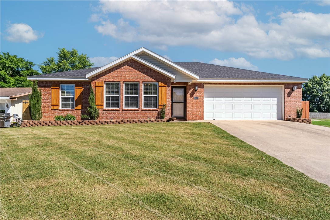 Motivated Sellers to pay $2,000 towards Closing Costs or an Allowance for Upgrades! Welcome to your affordable dream home near Beaver Lake! This 3-bedroom, 2-bath home is located on a spacious fenced lot, just a short leisurely stroll from the lake in Blue Springs Subdivision, located off the Hwy. 412E Bridge -- near War Eagle, Blue Springs, Ramsey Ramp boat launches. This brick home is warm and inviting, with wood floors, carpeted bedrooms, a neat and tidy landscaped yard that includes a new roof in 2023, new 2022 hot water heater, kitchen upgrades, stainless steel appliances that convey, covered patio, 10x10 backyard storage shed, quiet neighborhood and it qualifies for RD financing. This is a must see and won't last long. Schedule a showing now!