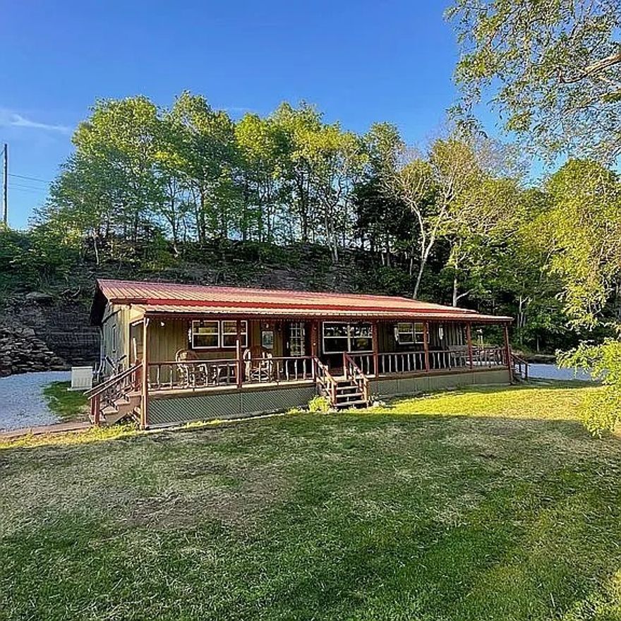 LOCATION, LOCATION, LOCATION! Everyone wants something between Jasper and Ponca. Here it is! This private 1484 SF 3 BR 2 BATH setting on 3.29 ac at Low Gap, Arkansas in the heart of the Upper Buffalo National River Region in beautiful Newton County, Arkansas. Located just 4.3 mi from Steel Creek Access & 4.5 miles from Ponca Access of the Buffalo National River. Features of the home include an updated kitchen, guest bath, bamboo floors, covered front porch, back deck, side deck, central HVAC with Wi-Fi smart thermostat, wood stove, 12Kw Kohler propane backup generator & 26'x20' shop/garage. Located 10.1 mi from Jasper off Hwy 74W with no dirt road but secluded with no homes in site.  Near the Ozark National Forest. Just a short drive from Russellville, Harrison, & Fayetteville. This central location is convenient to the best swimming holes, hiking, bike riding, canoeing, wildlife photography, ATV riding & fishing. Other nearby outdoor activities include horseback riding, mountaineering, caving, & scenic driving.