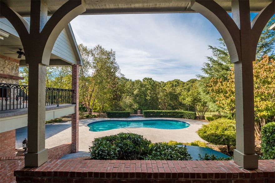 Grand Estate built for entertaining! Luxury home sits on 5+ acre lot with multiple Master Bedrooms, Executive Closets throughout, Custom built Bar, Storm Room/Tornado Shelter, Wine Cellar, Control 4 Whole House AV System throughout, lots of Storage and more. Outside oasis provides even more entertainment opportunities with multiple Patios overlooking Pool, Pool house, Fire Pit and spacious Yard. Close to Walmart Home Office and Bentonville schools/Bentonville West High School.