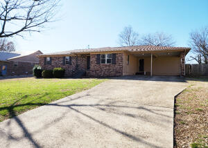 Great location just south of Harrison city limits off Hwy 7S in Southern Hills. Home had roof repairs in 2018; Near new interior paint on walls; ventless natural gas corner fireplace in living room; attached 2 car carport; enclosed back porch; privacy fence around backyard. Home does need some updating (kitchen & baths, most flooring, disposal not working+) but is well priced for a person wanting to put in some work and use as income property or as an updated residence.