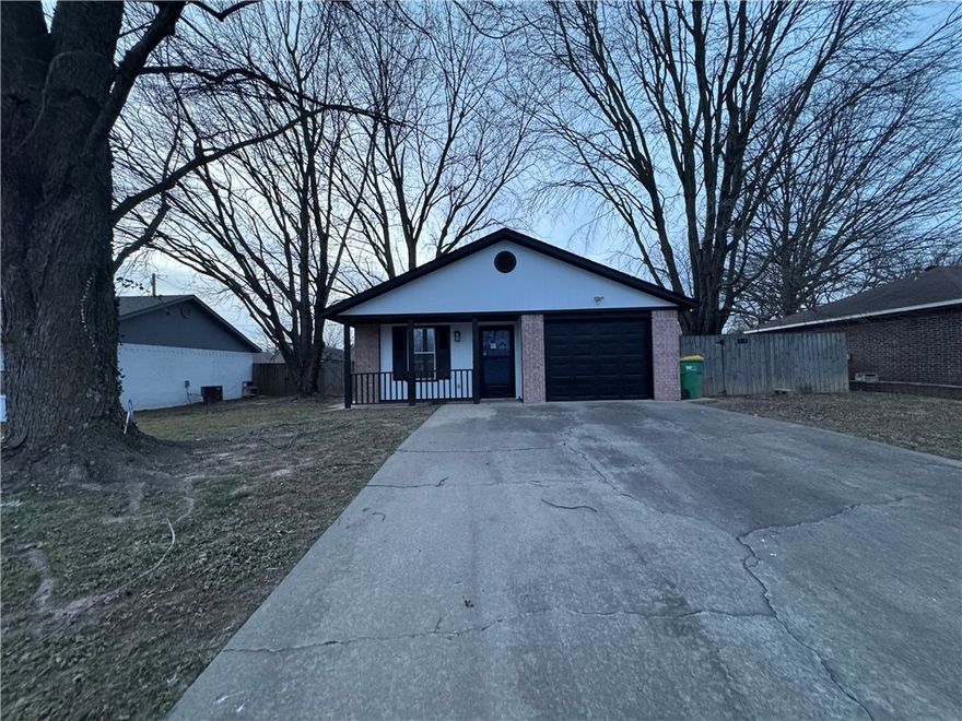 Like new home on the east side of Rogers. This 3 bedroom 2 bath home feature wood style flooring throughout main living area. Living room opens into kitchen where you have large eating area, stainless appliances, granite counters, and pantry. Bedrooms include carpet flooring. Primary bath has double vanity and large walk in closet. Covered patio and fenced yard.