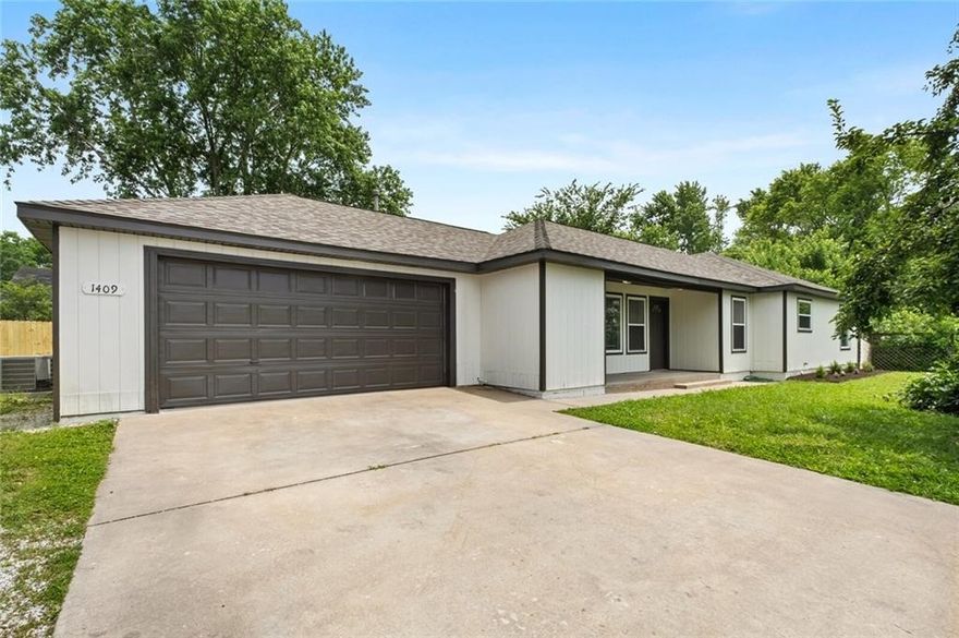 Fully remodeled & perfectly placed 3 bed 2 bath home sits minutes from Downtown Rogers, Lake Atlanta & the Razorback Greenway.  Fresh flooring, paint, recessed lighting & a bright open layout make it feel brand new.  The updated kitchen with new appliances is ready for everyday living or easy entertaining.  The primary suite offers a walk-in shower & dual vanities with a spacious guest bath to match.  Enjoy a covered front porch, 2 back porches, a generous yard & 2 car garage.  Homes this move-in ready don't last.  Ideal for a homeowner or a smart investor.  Schedule your showing now.