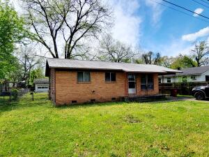 Great starter home or perfect rental. With a little TLC this home could be just what you are looking for. Offering 3 bedrooms, 1 bathroom, 1 car carport, and a shop building with concrete floor and electric. Hardwood floors in bedrooms and under laminate flooring in all rooms but bathroom. Large, fenced back yard, close to the intermediate school. Metal roof in 2015 and January 2023 new HVAC.