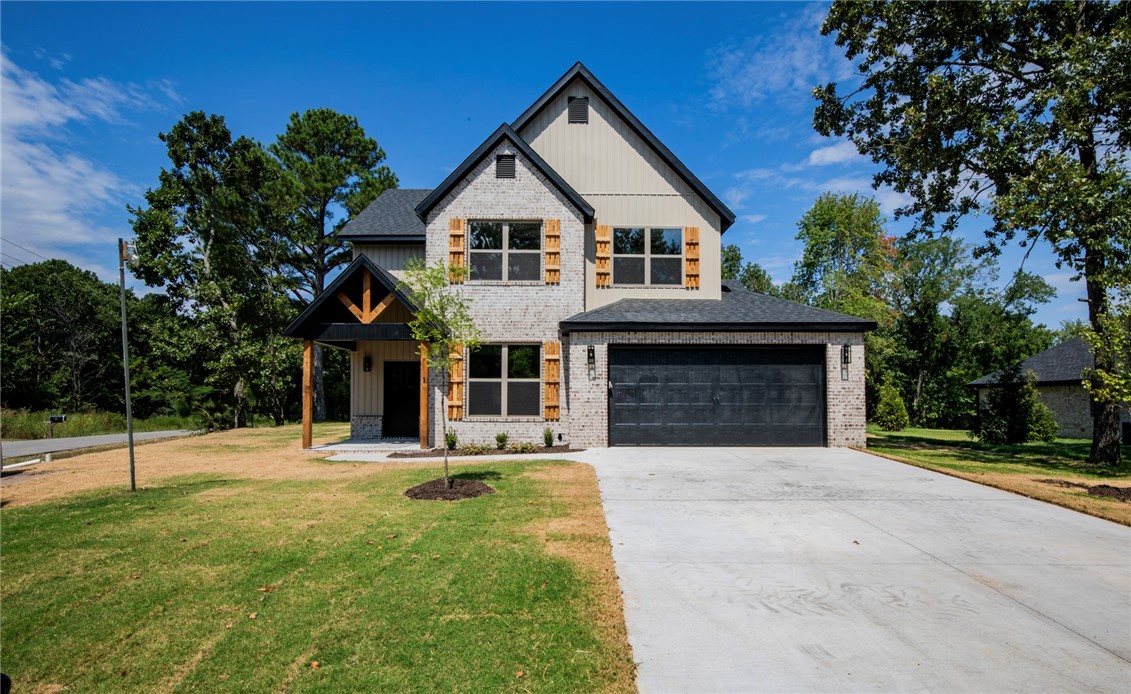 New construction Bella Vista home! 2 bed + Office/2.5 bath home on flat corner lot near The Highlands golf course, Branchwood Recreation Center, Lake Loch Lomond, with easy access to I-49 Bella Vista Bypass. Open concept/split bedroom floorplan boasts lots of natural light. High end finishes featuring hardwood floors in entry, living and master areas. Vaulted ceiling in living room, kitchen, dining area, stainless steel appliances, gas log fireplace, granite countertops, walk-in pantry, and large island. Large storage closet on main floor and walk-in/floored attic access. Spacious master suite features a large walk-in closet, double vanity, walk-in custom shower, and freestanding tub. Home is plumbed for a generator and covered patio for outside entertaining. Preferred lender offering $5,000 in closing costs paid.