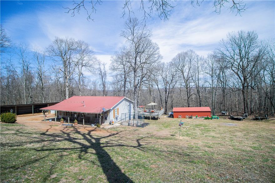 Beautiful 2 bedroom 1.5 bath home on 3.6 acres in the heart of Newton County, Arkansas.  Just minutes from the Buffalo National River and many hiking trails.  With the Ozark Mountains all around, you can have the perfect mini farm.  Newly remodeled kitchen with all new cabinets, countertops, hood, sink, and window. Recently remodeled bathroom with a beautiful walk in shower. Property includes a tractor barn, gazebo, chicken coop, fenced garden area, conex box for storage, pond, wood shop and shed both with electric. Thinking of building some nightly rentals?  This is the prime location and plenty of space to build, still live on the property, and have the privacy you crave.  Live and work in one spot!  So much opportunity in a private location that can't be beat!