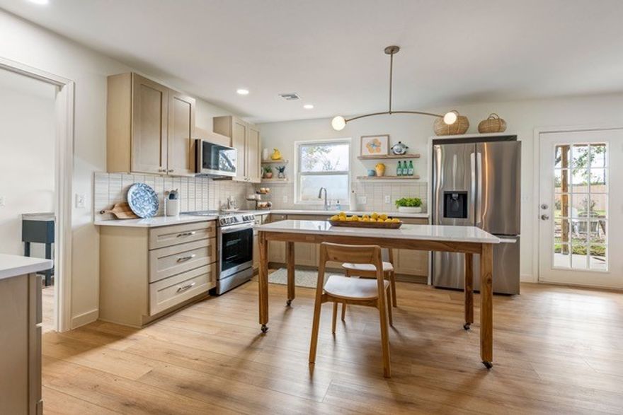 Location makes this property an amazing investment opportunity! The recent upscale renovation would make this a wonderful home or long-term or short-term rental while the immediate area thrives with current & planned development. The .38 acre level lot provides a large back yard with a covered patio and privacy fence. Kitchen has quartz countertops & new stainless appliances (dishwasher, microwave, range). Bathrooms have granite countertops & beautiful tilework. Laundry room has deep sink, cabinets, built-in ironing board. This property is located near corner of NE J & 10th Streets; walking distance to museums, Memorial Park, and Alice Walton School of Medicine; just 1.4 miles from Bentonville Square; less than one mile from new Walmart Campus; located near many trails for walkers, runners, bikers. NEW: roof, gutters, entire kitchen, entire bathrooms, closets, laundry room, flooring, paint, doors, fixtures & hardware, LED lighting. The design & quality of the renovation is comfortable & trendy with definite appeal.