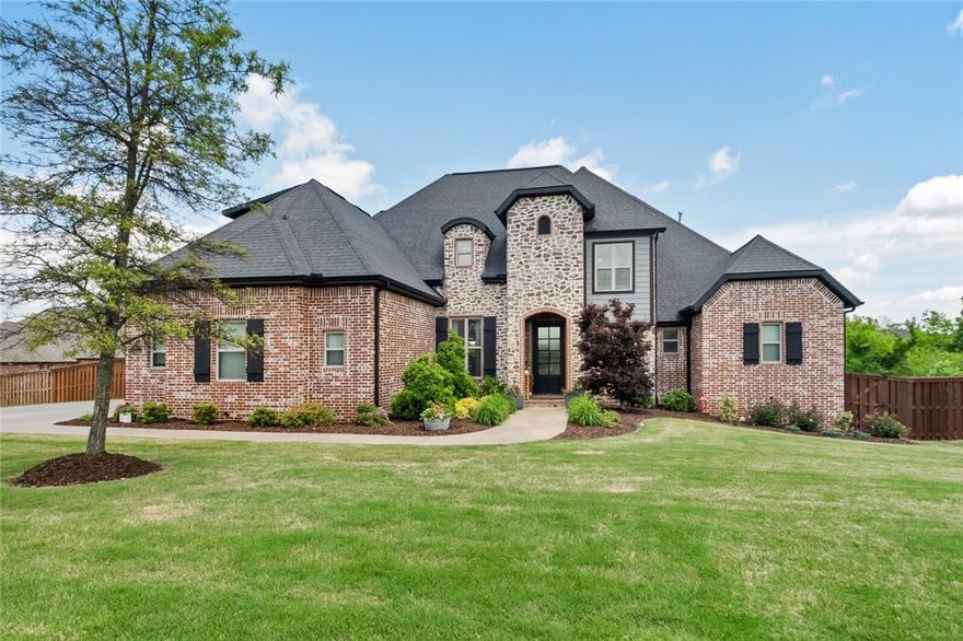 Stunning 4 bdrm, 3.5 bath home on 0.53 acres in the highly desired subdivision of Angel Falls w/ Coler Mountain Reserve accessible from your back fence! Decorators dream w/ open kitchen, living & dining room, designer lighting, accent walls throughout, spacious master suite, 2nd bdrm down, private office & bdrms w/ full bath & large bonus up. The interior charm is equally matched outside w/ the large covered deck & wood-burning fireplace overlooking the outdoor kitchen w/ built-in grill, pizza oven & tv, 2 pergolas, heated pool w/ diving board & the wooded tree-line showcasing NWA's natural beauty & the very popular Coler Mountain Reserve. This is one home you don't want to miss!