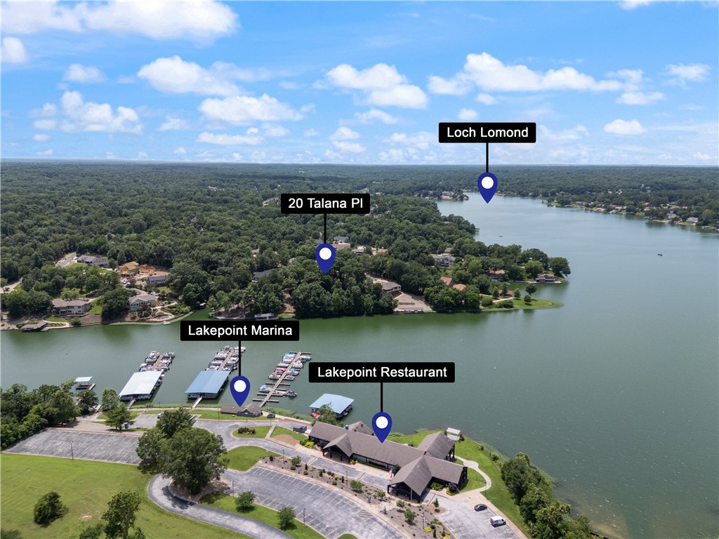 Premiere Loch Lomond Lakefront Lot! This lakefront lot is all about those stunning views and conveinient location. 141 ft of sea wall already in place in a "no wake" area. You can design your own home for ultimate relaxation, adventure, and memories that last a lifetime! You are a kayak ride away to Lake Point Grill and Marina. This is one of the last remaining Loch Lomond lakefront lots and none with a more stunning view as this. NO Sellers Property Disclosure on lot.