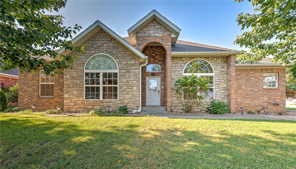 Charming corner lot home located in a well-established neighborhood in Rogers, just minutes from Downtown Rogers, shopping, parks, trails, and lakes. This inviting split-floor plan offers large kitchen space, abundant built-ins, a bright sunroom, and a beautifully landscaped yard with a storage unit in the backyard. Recent updates include a new roof (2019) and a newly installed garage door, making this home move-in ready!
