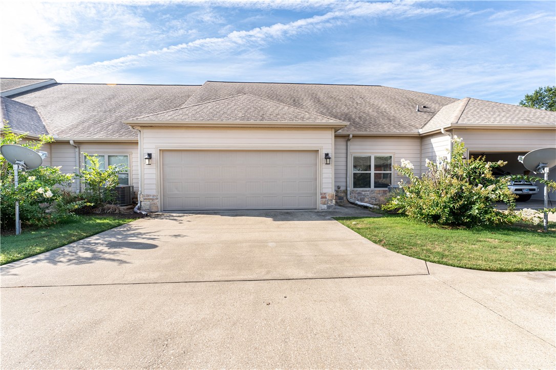 Ready to rent and pet friendly! Enjoy maintenance-free living in these spacious 3-bedroom, 2-bathroom townhomes featuring hardwood floors, tile, granite countertops, raised ceilings, wide hallways and doors, a private courtyard, and a large 2-car rear-entry garage. Located in a quiet, small community just 5 minutes from the Promenade shopping and dining and I-49, these beautifully designed homes offer both comfort and convenience. Photos are representative—actual unit may vary slightly in color, but the layout remains the same.
