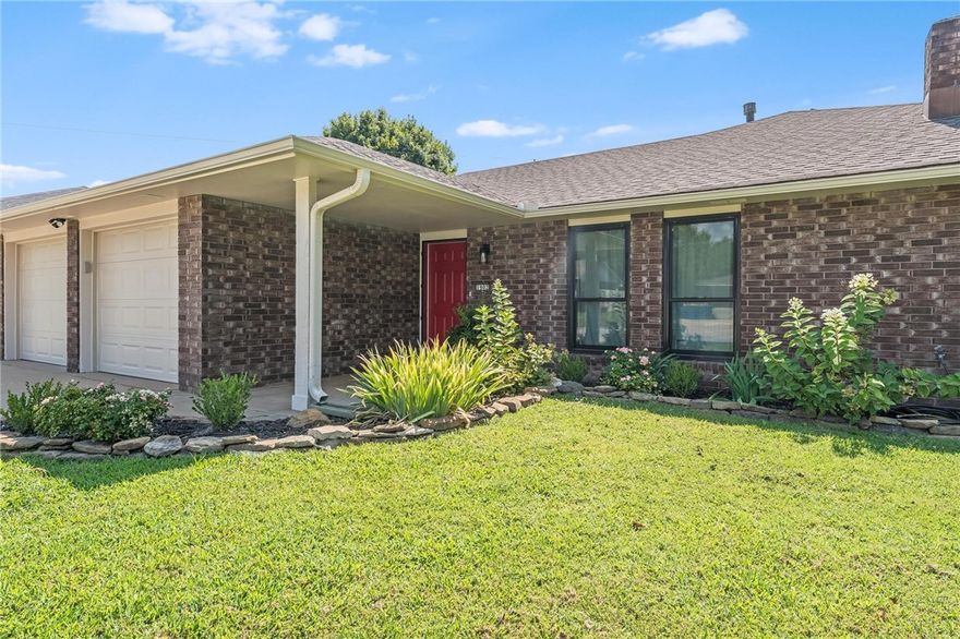 Perfectly positioned to enjoy all that Bentonville and Northwest Arkansas have to offer, this newly updated traditional ranch-style home pairs everyday comfort with prime convenience. The functional layout offers 2 primary suites, 2 bedrooms, 3 bathrooms, and two separate living rooms. The front living area is complete with a fireplace, while the other living space offers ample natural lighting and convenient access to the backyard. Outdoors, a private pool creates the perfect setting for summer gatherings or quiet evenings. The neighboring property’s lush garden adds charm to the surroundings, while the home’s inviting ambiance provides a personal retreat. Thoughtfully upgraded with new front windows, a newer roof, brand new garage doors, and more, this home provides improvements with possibilities to make it your own. Located within walking or biking distance to the new Walmart Home Campus, you’ll have effortless access to Downtown Bentonville, I-49, bike trails, and vibrant community events.