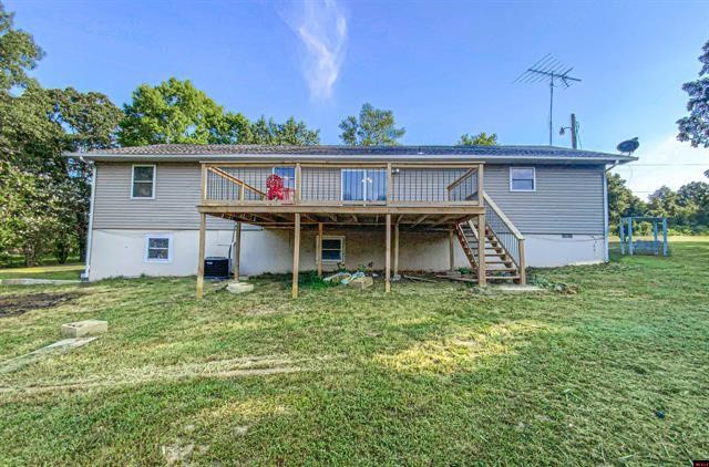 NEW, NEW, NEW!!! This 3 bedroom 2 bathroom has been completely remodeled and is move-in ready! New roof, new HVAC, new decks and railings, new toilets, new light fixtures, new electrical, new doors, new cabinets, new flooring, new water lines from the well head and a new Pump!! Sitting on 4 beautiful, level acres of fenced pasture, this property also boasts apple and pecan trees, a garden spot and a small barn/workshop with a chicken coop. Two bedrooms, kitchen, living room, laundry and office space on main level, with a large family room, additional bedroom and two spacious storage rooms in the basement. Donāt miss this one!